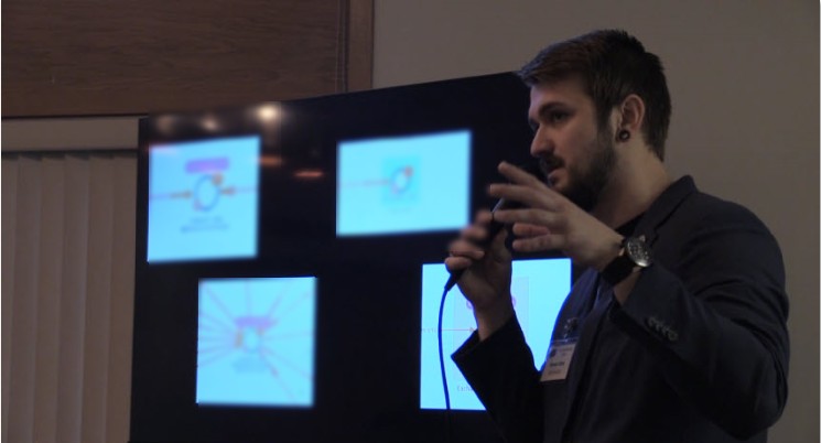 Kyeson Blake Utley explaining cryptocurrency transaction tracing graphs during a talk